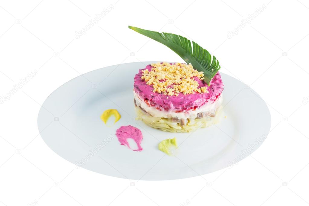 Russian traditional salad, dressed herring