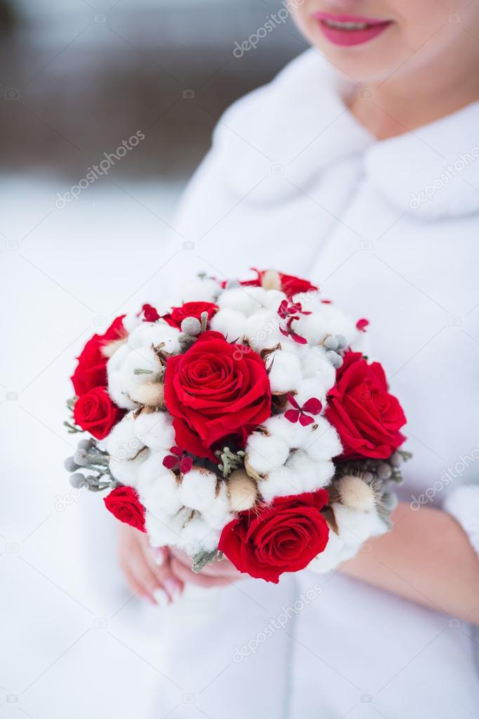 Beautiful wedding bouquet of red and white flowers