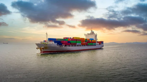 Container ship sailing the ocean, Business cargo logistics service and transportation of International container ship in the ocean freight transportation, Aerial view Container loading cargo freight