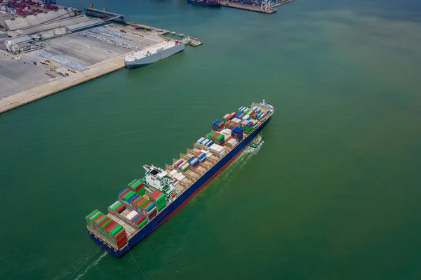 Container ship in export and import business and logistics. Shipping cargo to by the sea. Water transport International. concept Aerial top view from drone