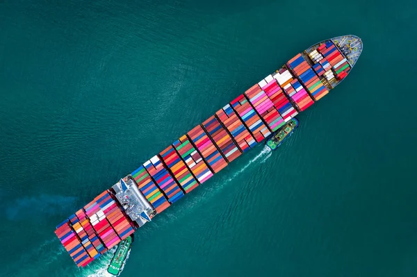 business service and industry shipping cargo containers transportation import and export international sailing on the sea aerial top view from drone