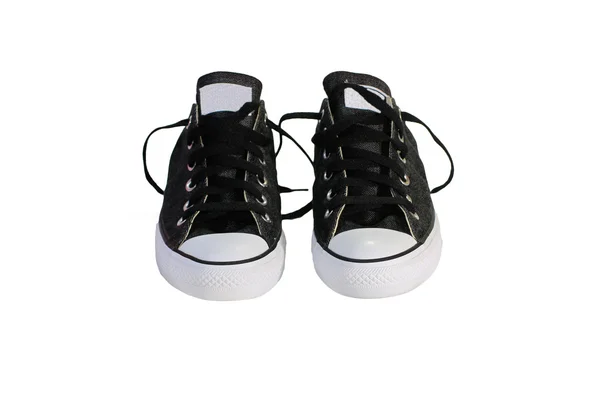 Zwart canvas schoenen met witte achtergrond — Stockfoto
