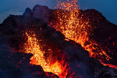 Closeup of Fagradalsfjall volcanic eruption at night in Reykjanes peninsula around 40 kilometres from Reykjavik, Iceland clipart