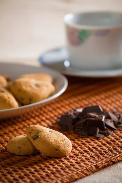 Cookies with chocolate chips on a tablecloth — Stock Photo, Image