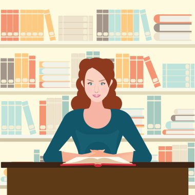 Kadın masasında kitap okumak.