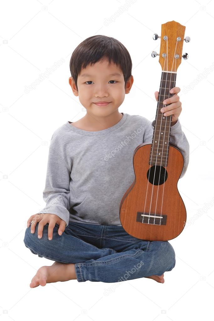 little boy with the ukulele