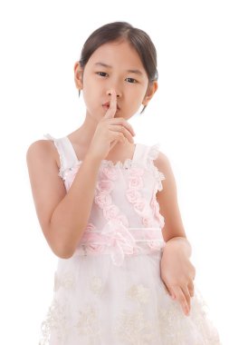 parmağını ağzına üzerinde ile şirin Asyalı kız hushing.