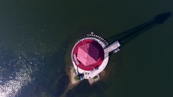 Aerial Lofty Beacon Standing Tiny Islet Trees Houses Open Sea — Stock Video