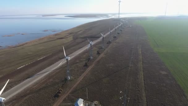 Aerial Shot Stripe Wind Energy Posts Spinning Blades Summer Inspiring — Vídeo de stock