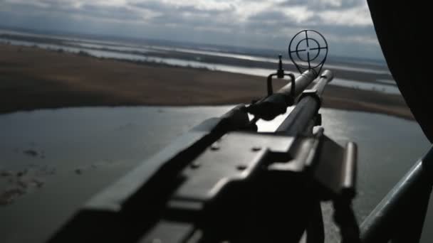 Large Machine Gun Front Sight Aimed Lake Helicopter Militant View — Stock Video