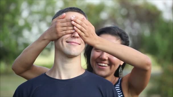 Girl gently hugs the guy and then laugh — Stock Video