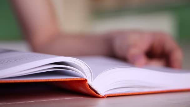 Guy reading a book 1 — Stock Video