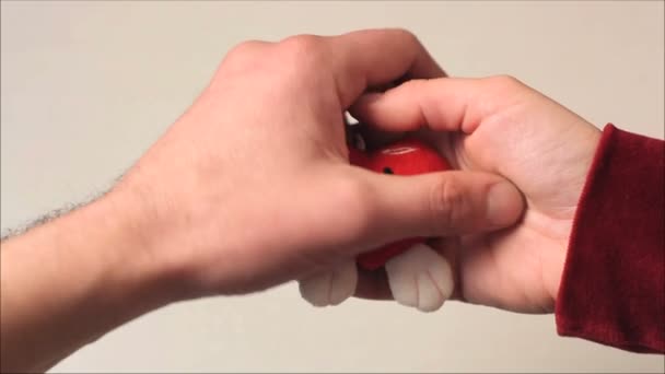 Father and son playing with toy — Stock Video