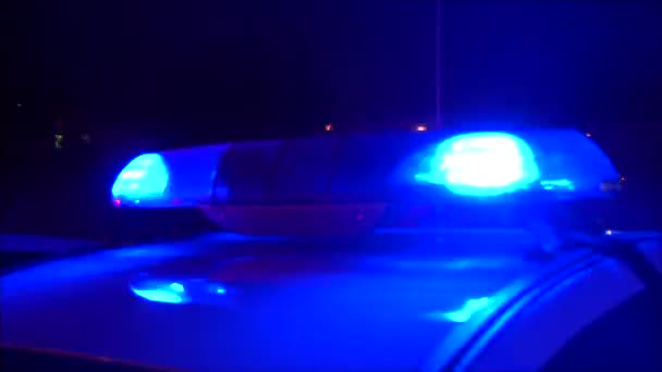 Luzes piscando em um carro da polícia — Vídeo de Stock