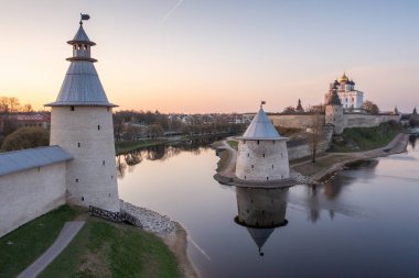 Velikaya River. View of the Pskov Kremlin and Trinity Cathedral clipart