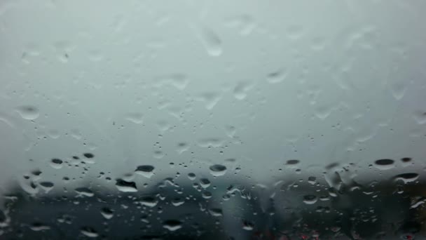 Defocused Highway Lights. Shot Through Passenger Window. Lots of Raindrops! — Stock Video