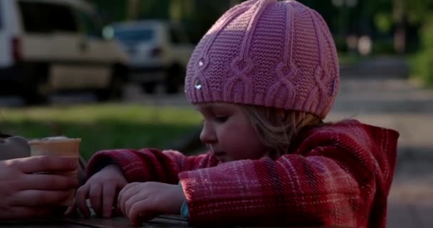 Pretty Little Girl Eating Ice Cream — Stock Video