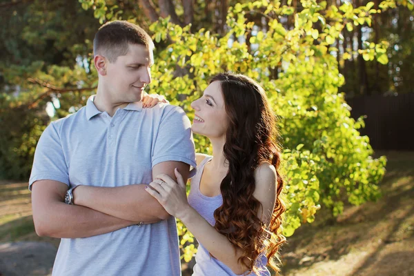 Beautiful couple in the woods — Stock Photo, Image