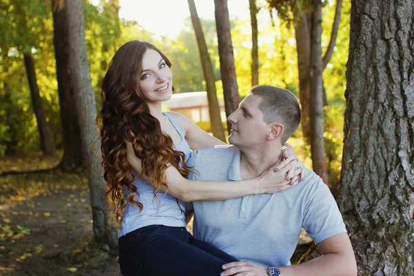 Beautiful couple in the woods — Stock Photo, Image