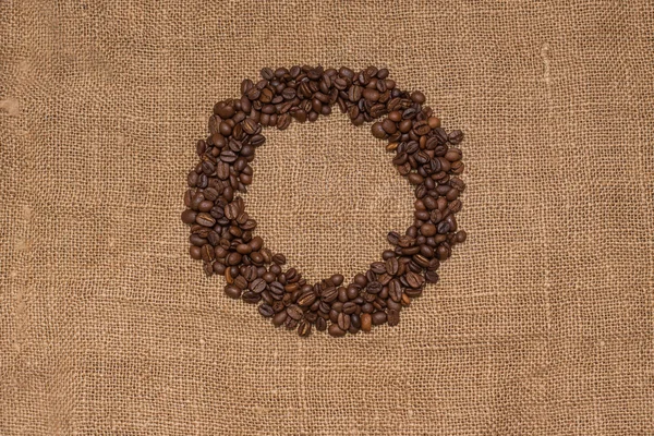 Coffee beans burlap fabric — Stock Photo, Image