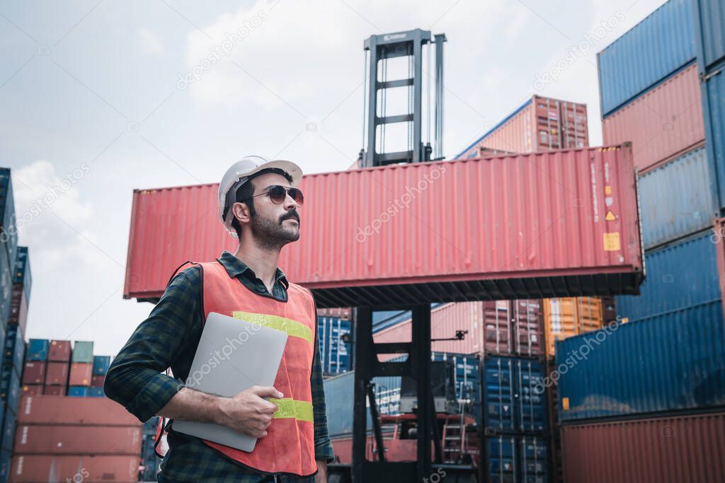 Container Supervisor Control Import/Export While Inspecting Containers Box in Warehouse Storage Distribution. Container Logistics Shipping Controlling of Transportation Industry, Cargo Ship Factory