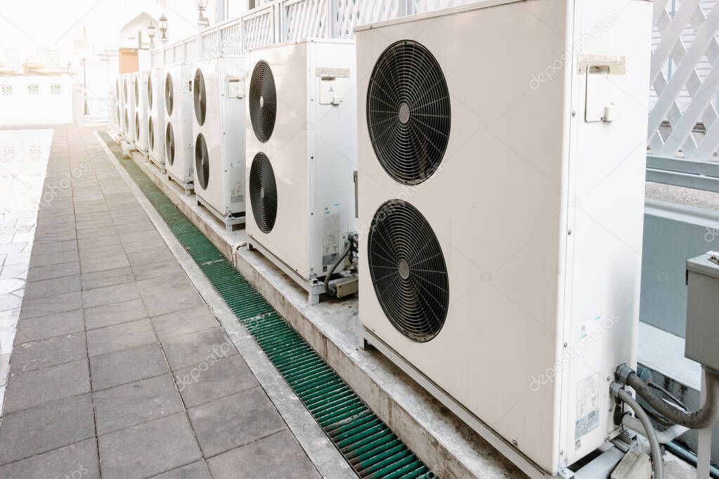 Cooling Air Condition Unit and Control System, Air Condenser Engine Station Outside Building of HVAC Systems. Electrical Compressor Fan Coil of Air Conditioning Equipment for Home Residential Units.