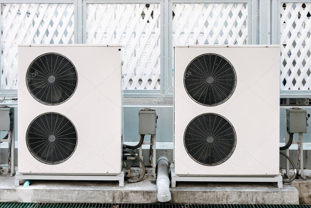 Cooling Air Condition Unit and Control System, Air Condenser Engine Station Outside Building of HVAC Systems. Electrical Compressor Fan Coil of Air Conditioning Equipment for Home Residential Units.