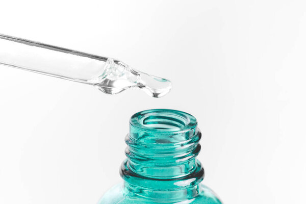 Dropper glass bottles with pipette. Transparent hyaluronic natural beauty product and eco serum skin care concept. Top horizontal view copyspace.