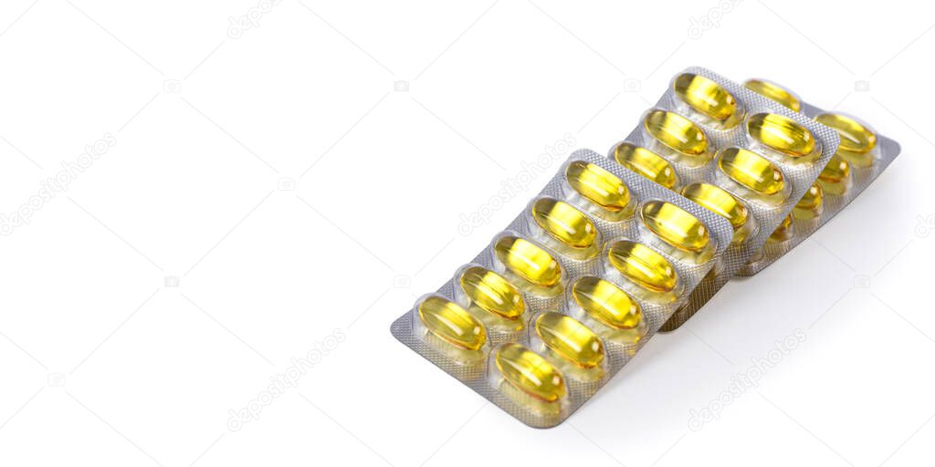 Omega 3 capsules in plastic packaging on a white background. Fish oil, vitamins. Health care and medicine concept. Copy space.