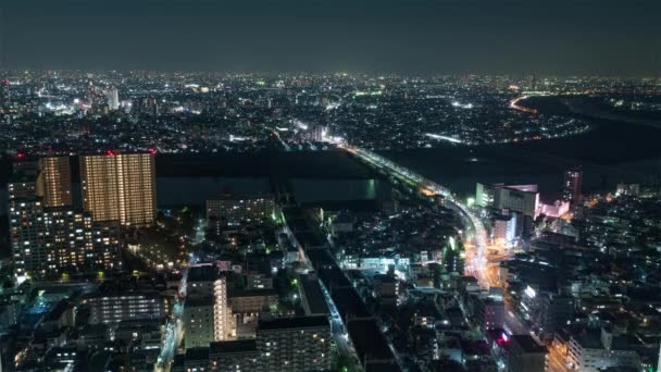 Tokio, Japonsko, Timelapse - Tokijský městský provoz v noci z vyhlídkové paluby města Ichikawa — Stock video