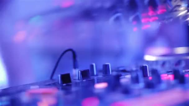 DJ plays on the remote in a nightclub. Close-up of DJ Console. — Stock Video