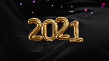 2021 yazıtları, konfetili siyah saten kumaş dalgasındaki altın balonlardan.