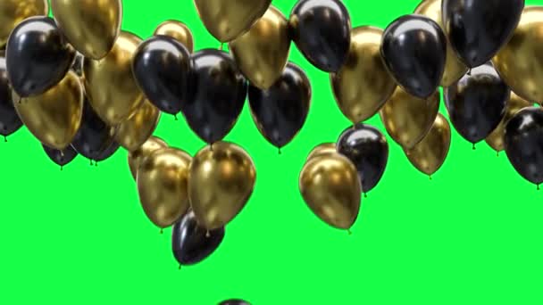 Goldene und schwarze Luftballons an der Decke auf grünem Hintergrund — Stockvideo