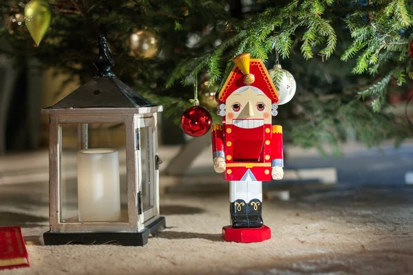 Nutcracker under the Christmas tree — Stock Photo, Image