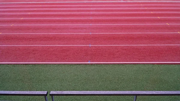 Olympic stadium track with grass