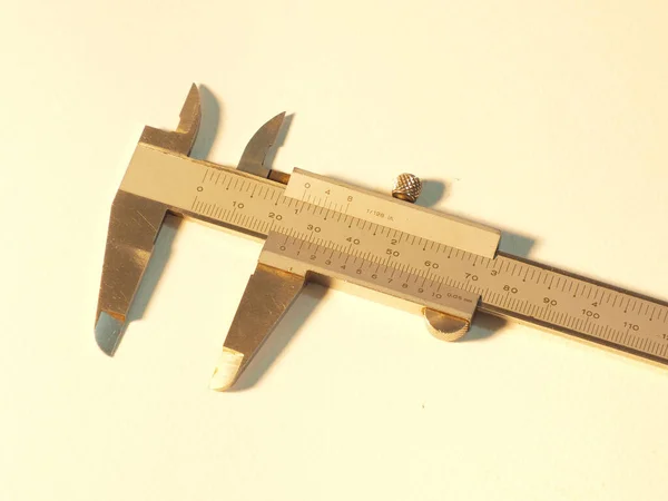 Vernier caliper in a white background.