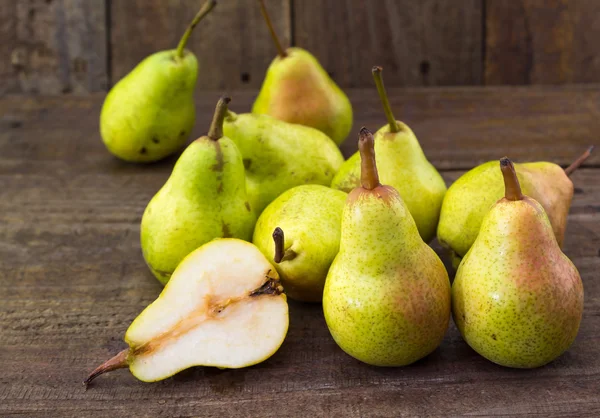 Pears on wood background — Stock Photo, Image