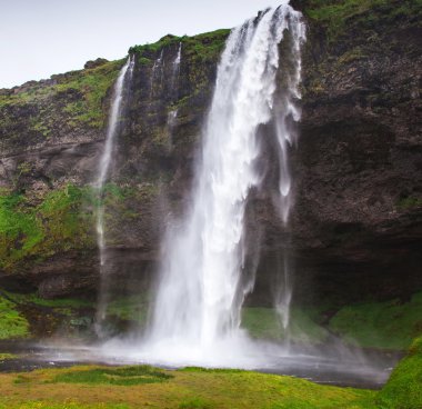 Iceland, Seljalandsfoss waterfall in a rainy summer day