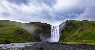 Iceland, Skogafoss waterfall in a rainy summer day