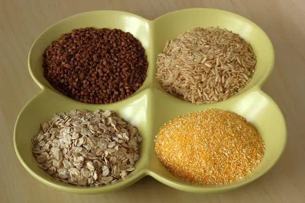 Variety of healthy grains and seeds in bowl — Stock Photo, Image