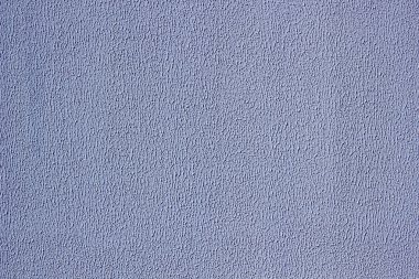 Plaster texture wall. Exterior blue stucco. clipart