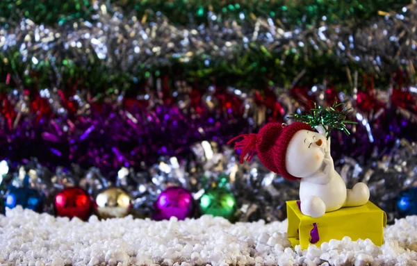 Snowman in a red cap — Stock Photo, Image