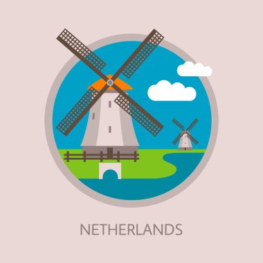 Peyzaj ve bulutlar ile geleneksel Hollanda yel değirmenleri.