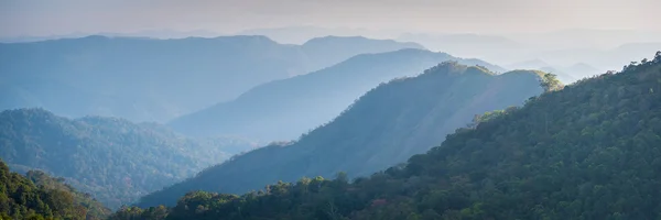 Mountains in fog, banner size photo