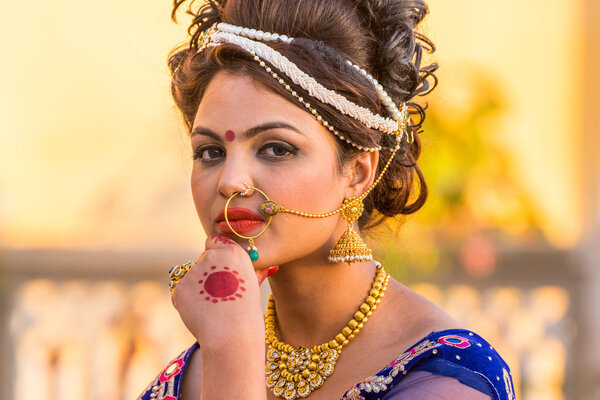 Beautiful Indian woman with ethnic makeup