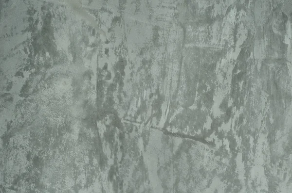 Textuur van de grijze gepolijst betonnen muur — Stockfoto