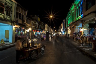 PHUKET, THAILAND - NOVEMBER, 01. 2015: People moving on the old  clipart