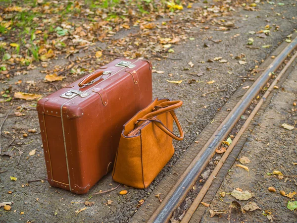 Retro luggage in the autumn season is the railway transport