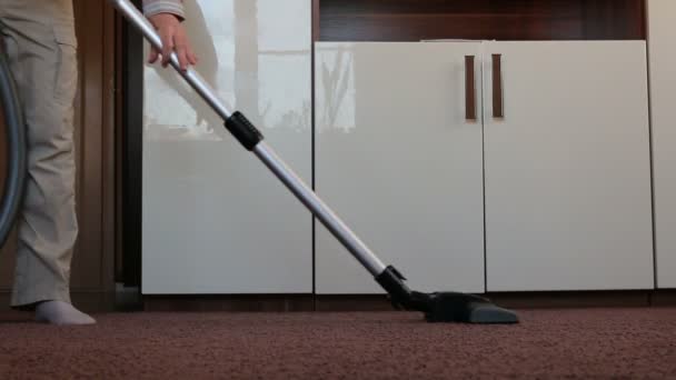 Man with the child clean apartment a vacuum cleaner — Stock Video