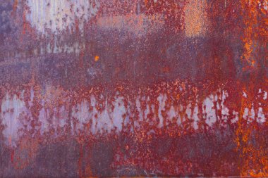 Kırmızı metalik paslı yüzeyi dokulu bir arka plan olarak